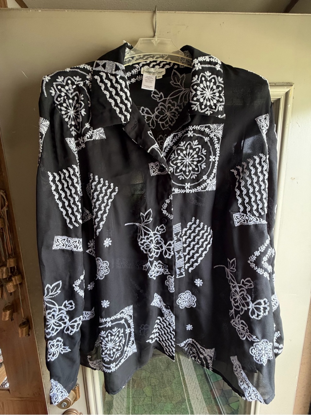 Coldwater Creek Black Blouse with White Embroidered Floral Design